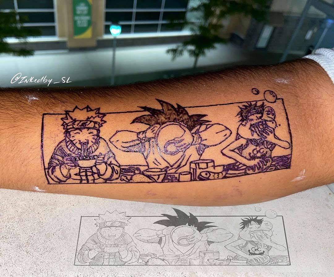 A client showing off the tattoos they received from Inked by SL.