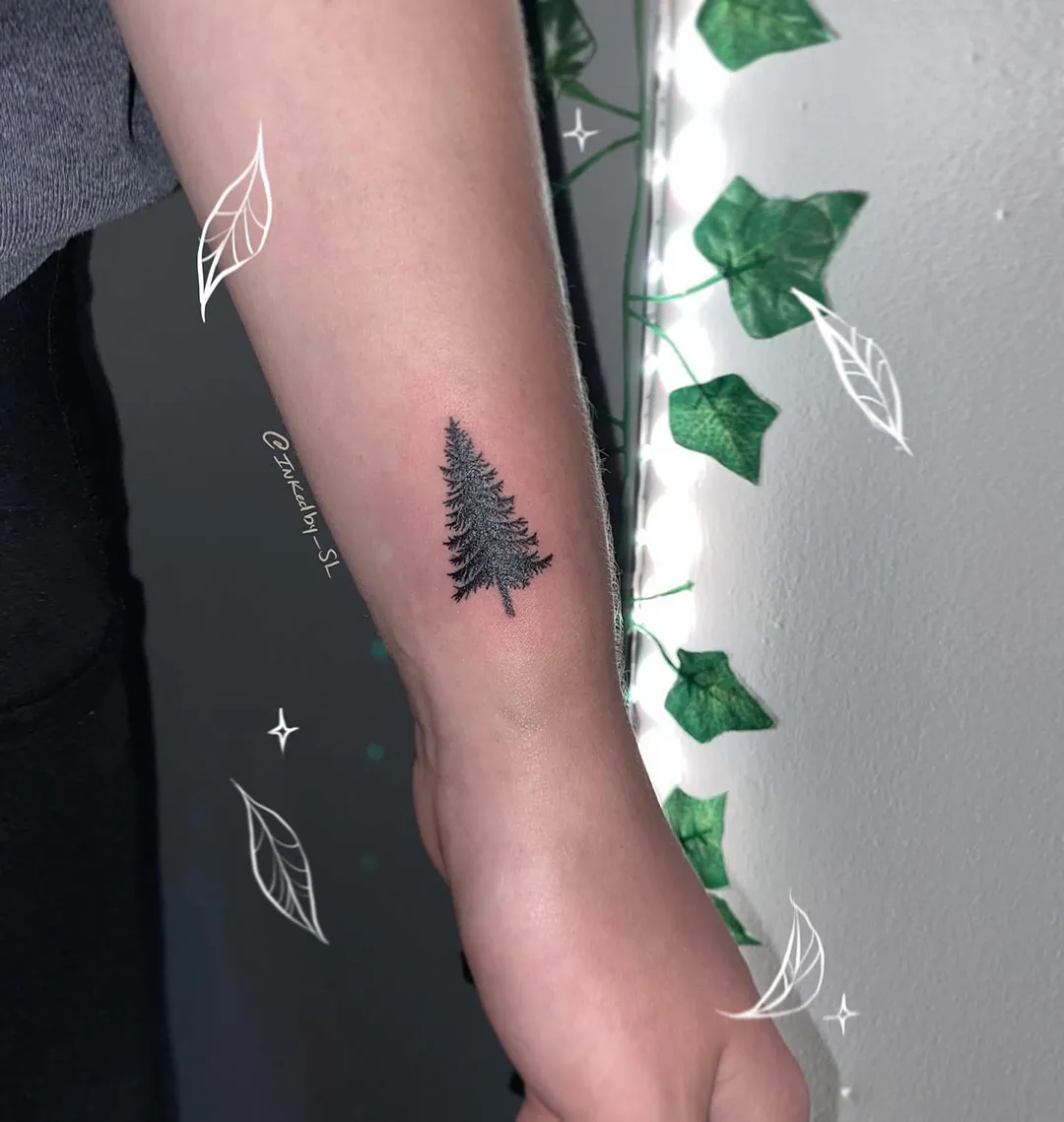 A client showing off the tattoos they received from Inked by SL.